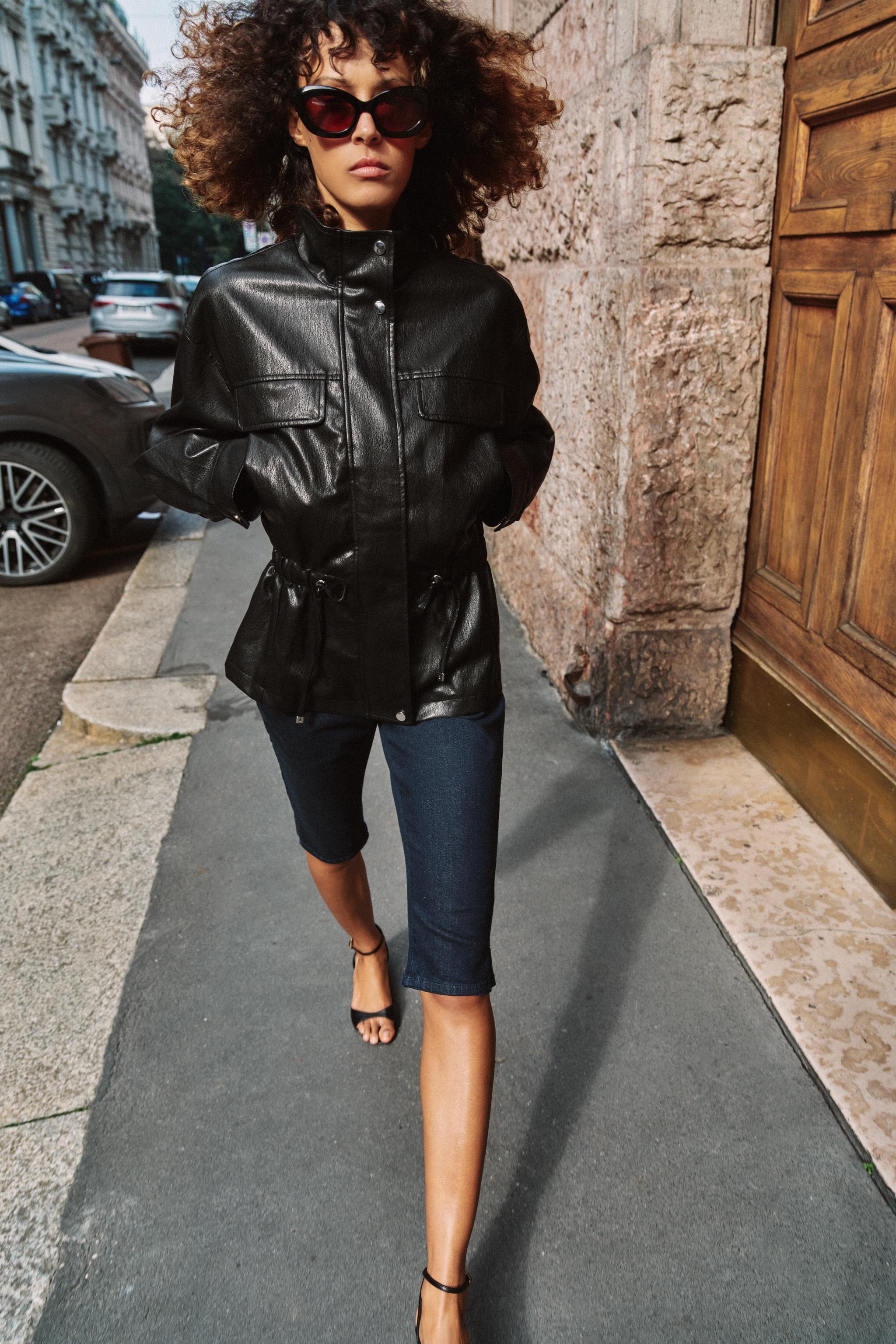BLOUSON MATIÈRE SYNTHÉTIQUE COL MONTANT